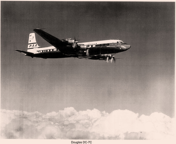 A Pan Am "Seven Seas" in its natural element: DC 7C in flight